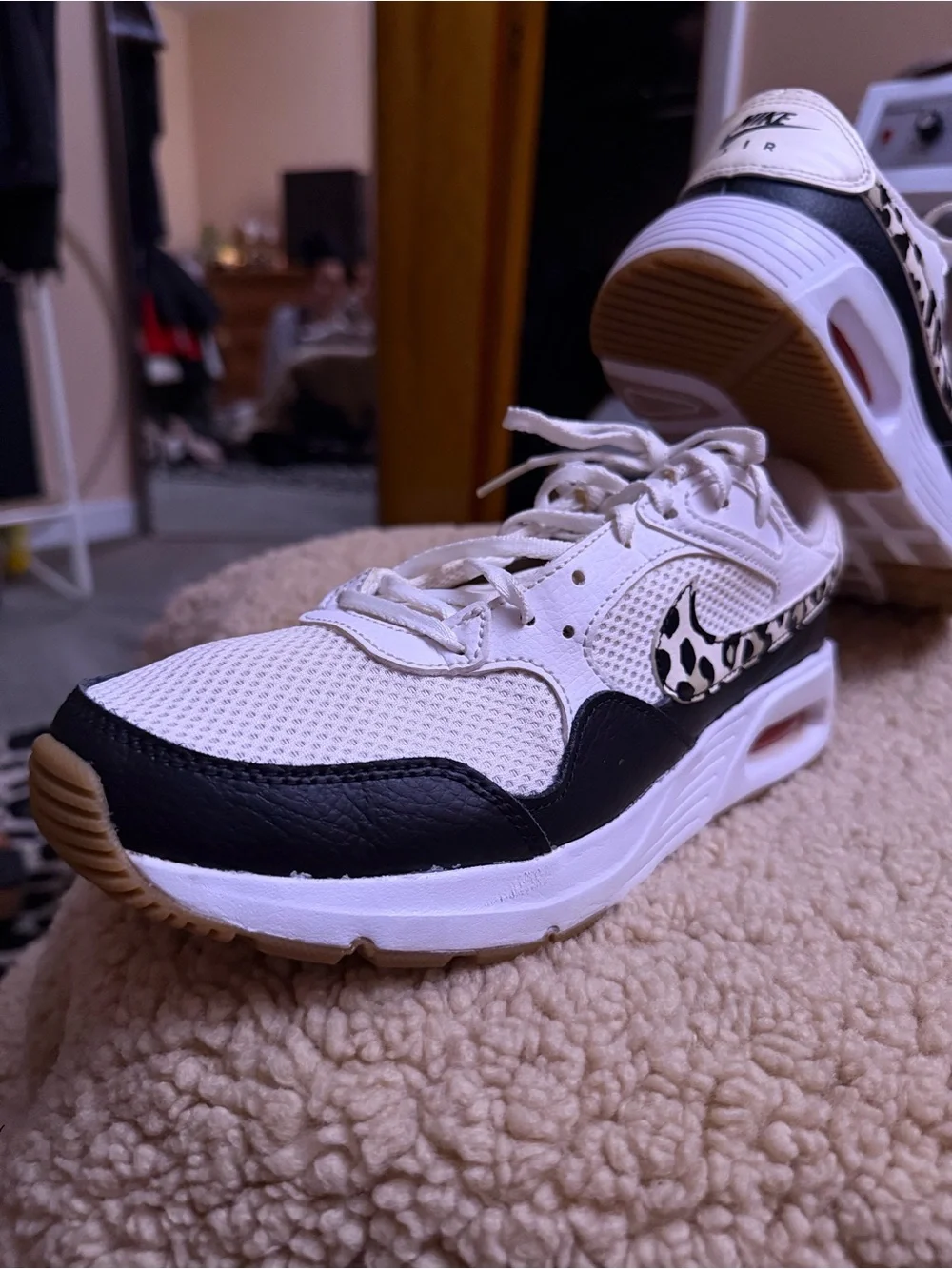 Nike Women’s White and Black Athletic Sneakers with Leopard Swoosh